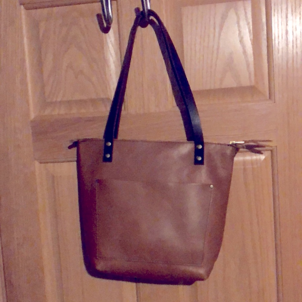 Portland, leather goods light brown bucket purse.